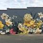 "flower murals on buildings", источник: www.thisiscolossal.com
