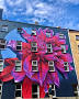 Street Artist Paints Sides of Buildings With Vibrant Flower ...
